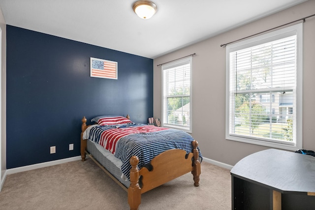 3144 Holly Pt, Clarksville, TN 37043 - bedroom featuring carpet flooring, baseboards, and multiple windows