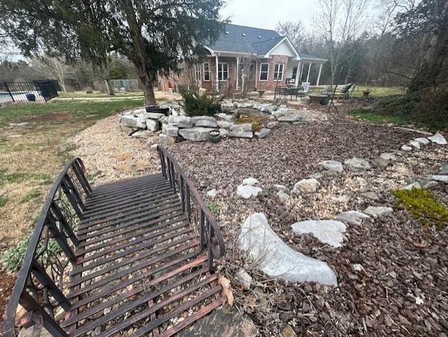 view of yard with a patio and stairs