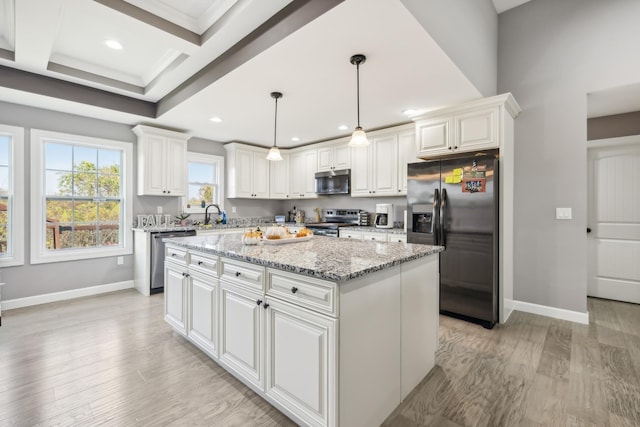 855 Sneed Blvd, Lafayette, TN 37083 - kitchen with baseboards, recessed lighting, appliances with stainless steel finishes, and a kitchen island