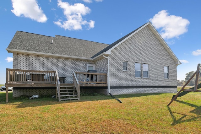 855 Sneed Blvd, Lafayette, TN 37083 - back of property with a yard, roof with shingles, a wooden deck, and brick siding