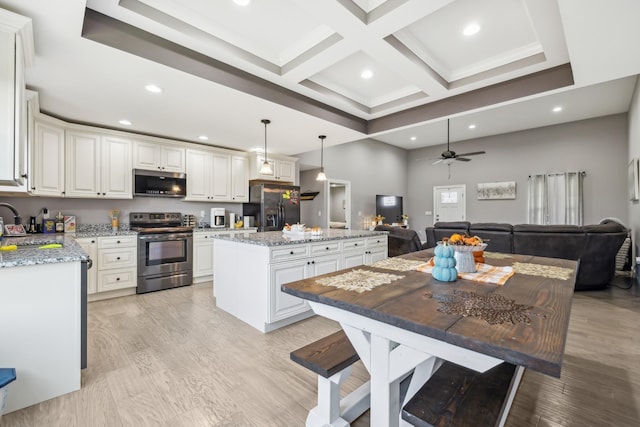 855 Sneed Blvd, Lafayette, TN 37083 - kitchen with a center island, stainless steel appliances, open floor plan, and recessed lighting