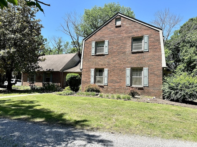 2311 Center Point Rd, Hendersonville, TN 37075 - colonial inspired home with brick siding and a front yard