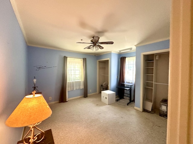 2311 Center Point Rd, Hendersonville, TN 37075 - bedroom featuring multiple windows, ornamental molding, baseboards, light carpet, and a ceiling fan
