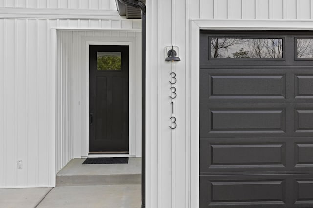 3313 Parker Ln, Chattanooga, TN 37419 - property entrance with board and batten siding and a garage