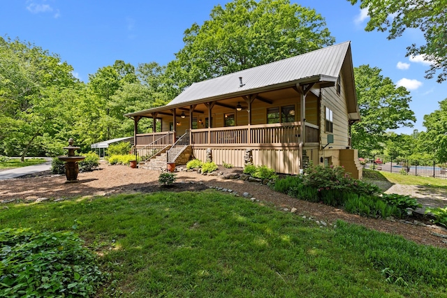 1708 Sugar Ridge Rd, Spring Hill, TN 37174 - view of front facade with a ceiling fan, metal roof, a porch, and stairway