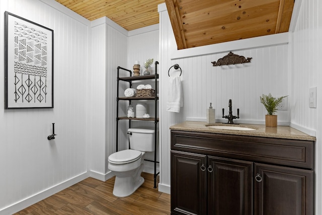 1708 Sugar Ridge Rd, Spring Hill, TN 37174 - bathroom featuring toilet, wood finished floors, vanity, wooden ceiling, and baseboards