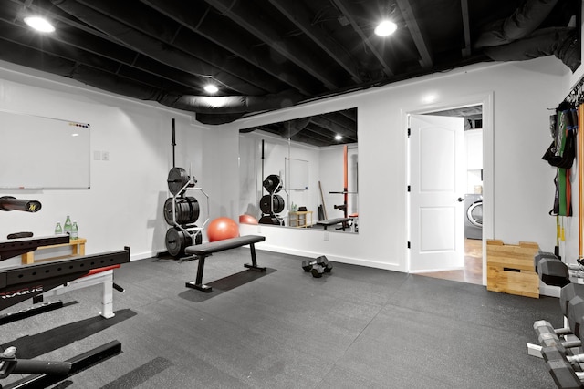 1708 Sugar Ridge Rd, Spring Hill, TN 37174 - workout room featuring washer / dryer and baseboards