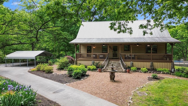 1708 Sugar Ridge Rd, Spring Hill, TN 37174 - chalet / cabin with a porch, stairs, ceiling fan, a carport, and metal roof