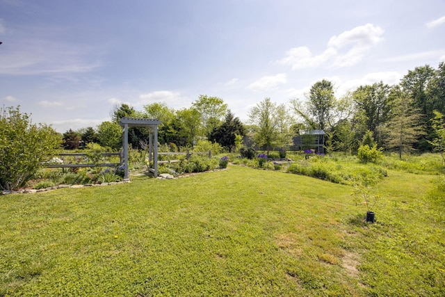 view of yard featuring fence