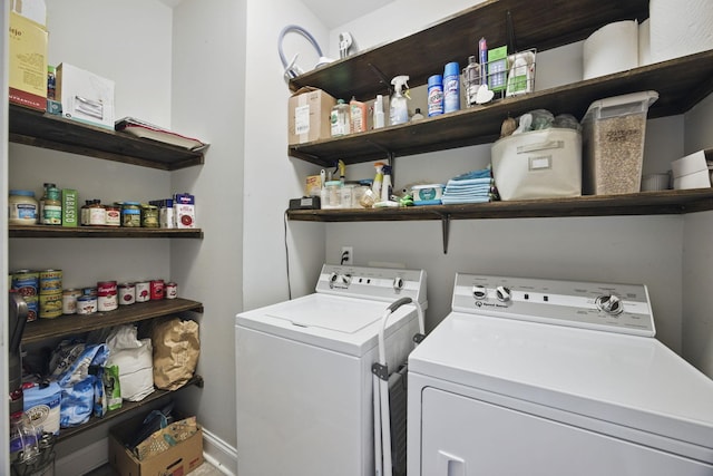 laundry area with washing machine and dryer and laundry area