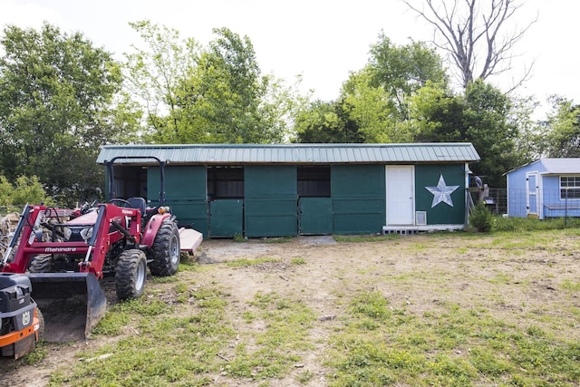 view of outbuilding with an outbuilding