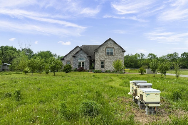 view of front of house with stone siding
