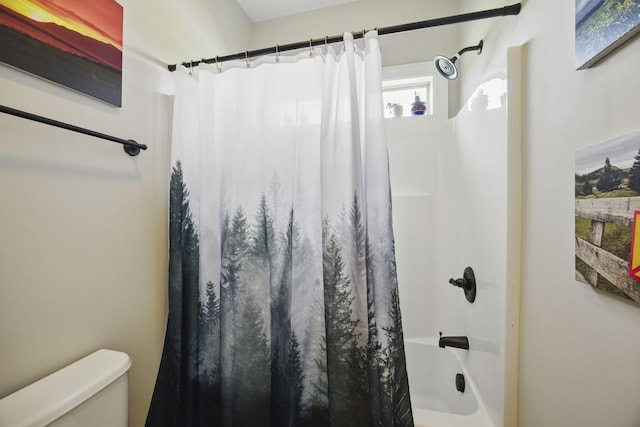 full bath featuring toilet and shower / bathtub combination with curtain