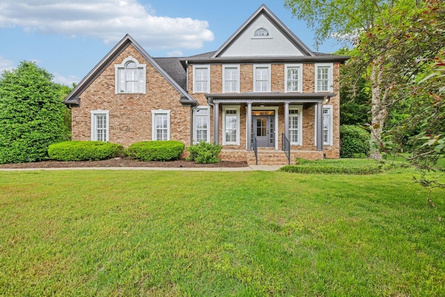 1207 Mullberry Ct, Murfreesboro, TN 37130 - view of front of house featuring brick siding, a front yard, and a porch