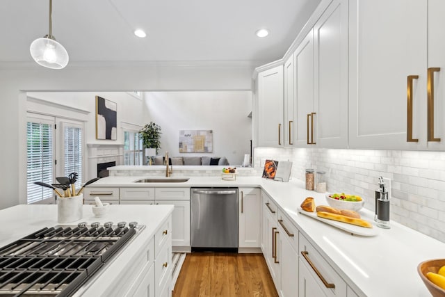 1207 Mullberry Ct, Murfreesboro, TN 37130 - kitchen with ornamental molding, light countertops, stainless steel appliances, and a sink