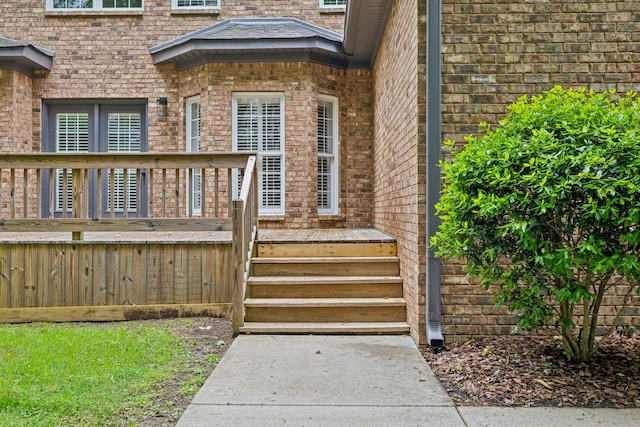 1207 Mullberry Ct, Murfreesboro, TN 37130 - doorway to property with brick siding and a wooden deck