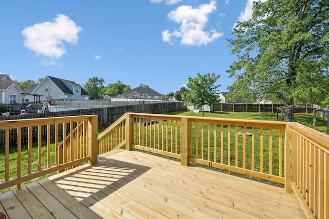 wooden terrace with a residential view