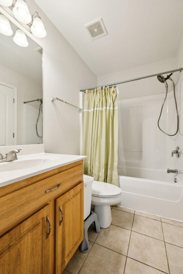 bathroom featuring toilet, shower / bath combo with shower curtain, tile patterned floors, visible vents, and vanity