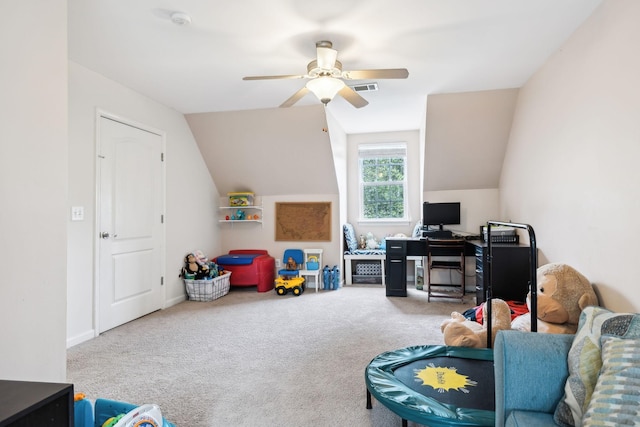 game room featuring ceiling fan, lofted ceiling, carpet flooring, and visible vents