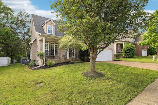 view of front of property with driveway, a front lawn, and fence