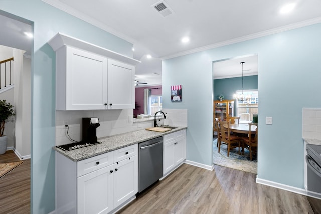 kitchen featuring a sink, crown molding, light wood-type flooring, and dishwasher