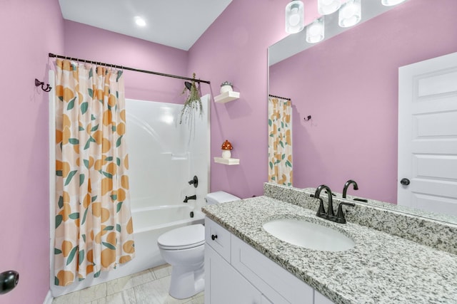 bathroom with toilet, marble finish floor, vanity, and shower / bath combo with shower curtain