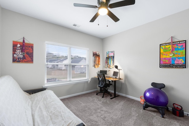 office featuring a ceiling fan, carpet floors, baseboards, and visible vents