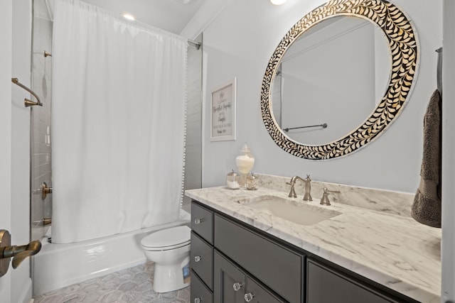 bathroom featuring shower / bath combo with shower curtain, toilet, and vanity
