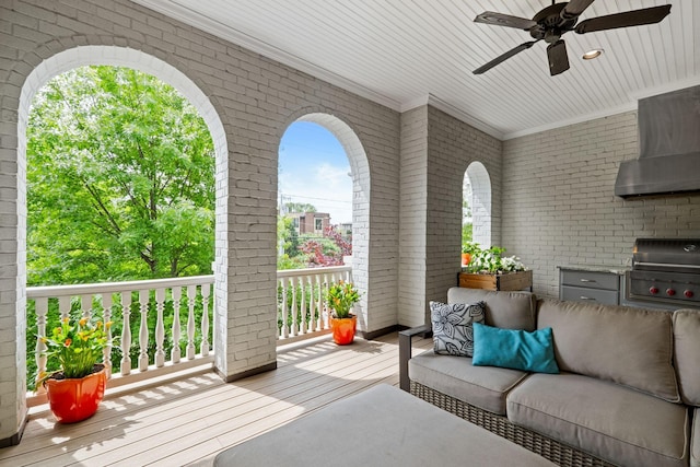 exterior space with an outdoor living space, a grill, and a ceiling fan