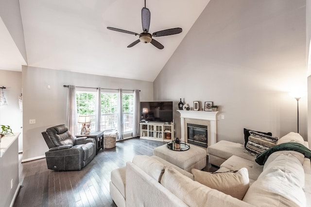 1040 Mansker Farm Blvd, Hendersonville, TN 37075 - living area featuring high vaulted ceiling, a ceiling fan, dark wood-style floors, a glass covered fireplace, and baseboards