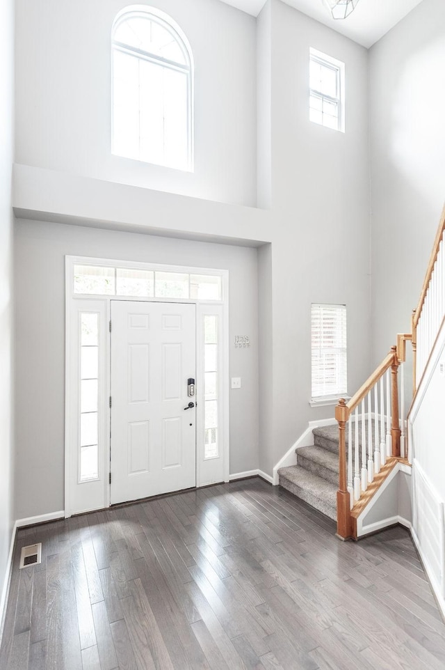 1040 Mansker Farm Blvd, Hendersonville, TN 37075 - entrance foyer with stairway, a high ceiling, wood finished floors, and baseboards