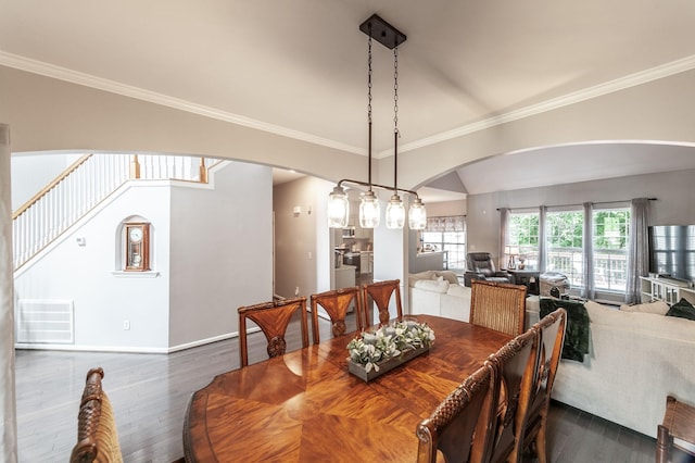 1040 Mansker Farm Blvd, Hendersonville, TN 37075 - dining room featuring arched walkways, dark wood finished floors, ornamental molding, baseboards, and stairway