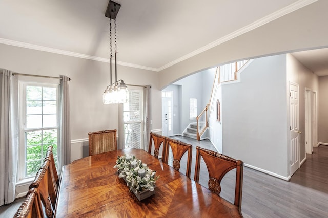 1040 Mansker Farm Blvd, Hendersonville, TN 37075 - dining room with stairs, ornamental molding, arched walkways, wood finished floors, and baseboards