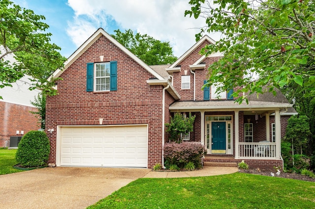1040 Mansker Farm Blvd, Hendersonville, TN 37075 - traditional-style home with concrete driveway, a garage, brick siding, covered porch, and a front lawn