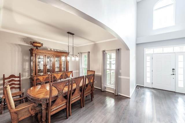 1040 Mansker Farm Blvd, Hendersonville, TN 37075 - dining room featuring arched walkways, dark wood-type flooring, baseboards, and ornamental molding
