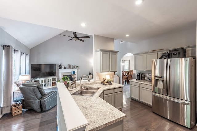 1040 Mansker Farm Blvd, Hendersonville, TN 37075 - kitchen featuring stainless steel fridge, a sink, arched walkways, a peninsula, and a ceiling fan