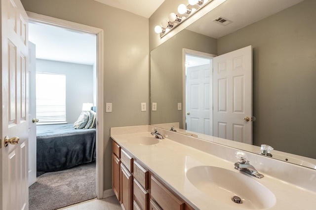 1040 Mansker Farm Blvd, Hendersonville, TN 37075 - ensuite bathroom with double vanity, tile patterned flooring, and baseboards
