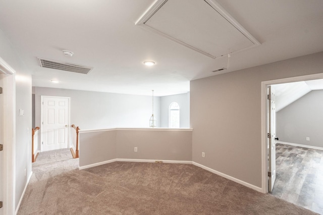 1040 Mansker Farm Blvd, Hendersonville, TN 37075 - spare room with attic access, baseboards, and light carpet