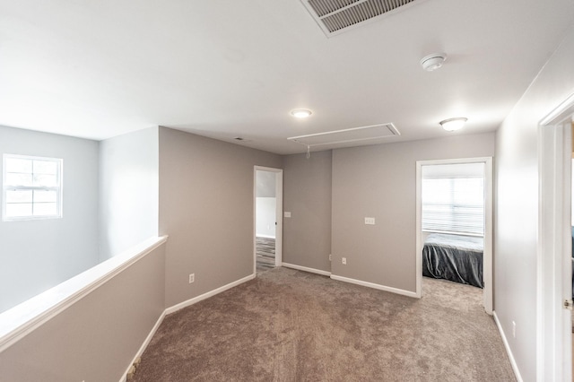 1040 Mansker Farm Blvd, Hendersonville, TN 37075 - carpeted empty room featuring attic access, baseboards, and a smoke detector