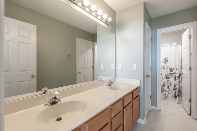 1040 Mansker Farm Blvd, Hendersonville, TN 37075 - bathroom featuring double vanity, tile patterned floors, and baseboards