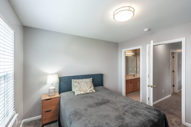 1040 Mansker Farm Blvd, Hendersonville, TN 37075 - carpeted bedroom featuring baseboards and connected bathroom