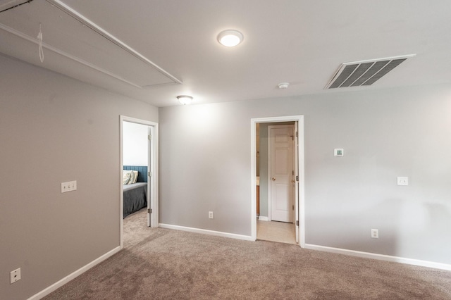 1040 Mansker Farm Blvd, Hendersonville, TN 37075 - unfurnished room featuring attic access, carpet, baseboards, and a smoke detector