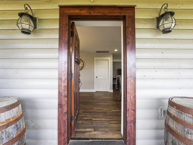 doorway to property featuring visible vents