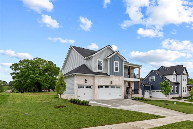 craftsman house featuring a balcony, board and batten siding, an attached garage, concrete driveway, and a front yard