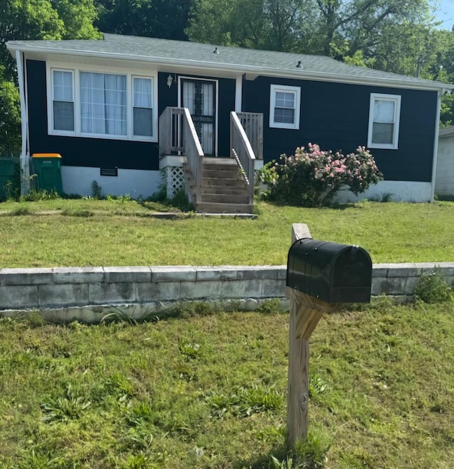 view of front of home with a front yard