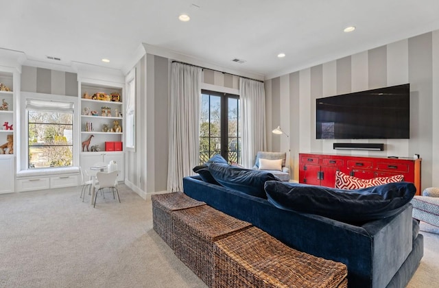 carpeted living area featuring visible vents, baseboards, wallpapered walls, and recessed lighting