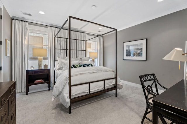 bedroom with baseboards, recessed lighting, visible vents, and light colored carpet