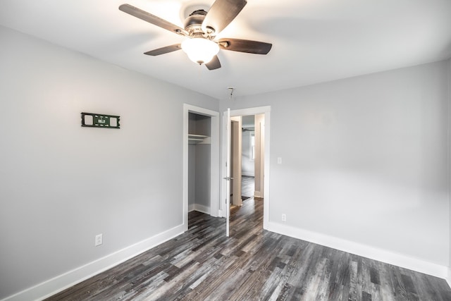 709 Ann Ave, Gallatin, TN 37066 - unfurnished bedroom with a ceiling fan, baseboards, a closet, and dark wood-type flooring