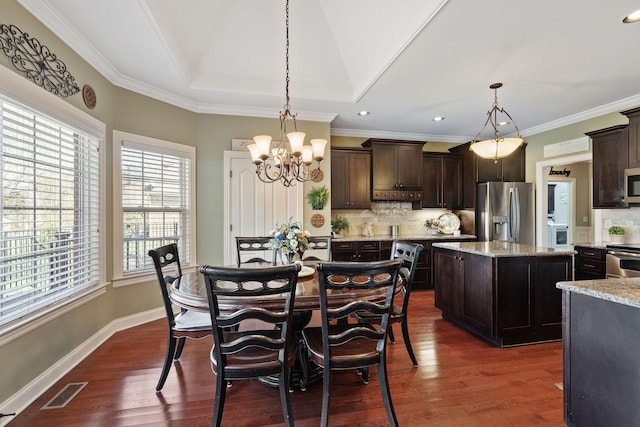 dining space featuring ornamental molding, visible vents, recessed lighting, dark wood finished floors, and a chandelier