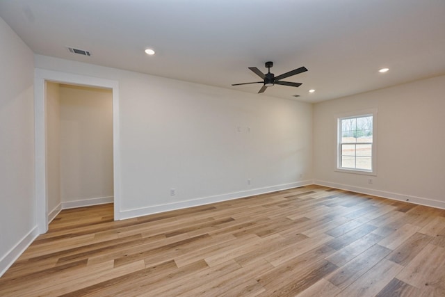 unfurnished room featuring light wood-style floors, visible vents, ceiling fan, and recessed lighting